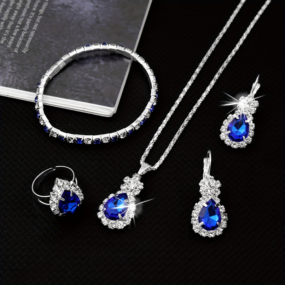 Dazzling Blue Teardrop Jewelry Set for Women - Timeless Elegance in Stainless Steel, 4-Piece Luxurious Style Ensemble, Including Necklace, Bracelet, Ring, and Stud Earrings